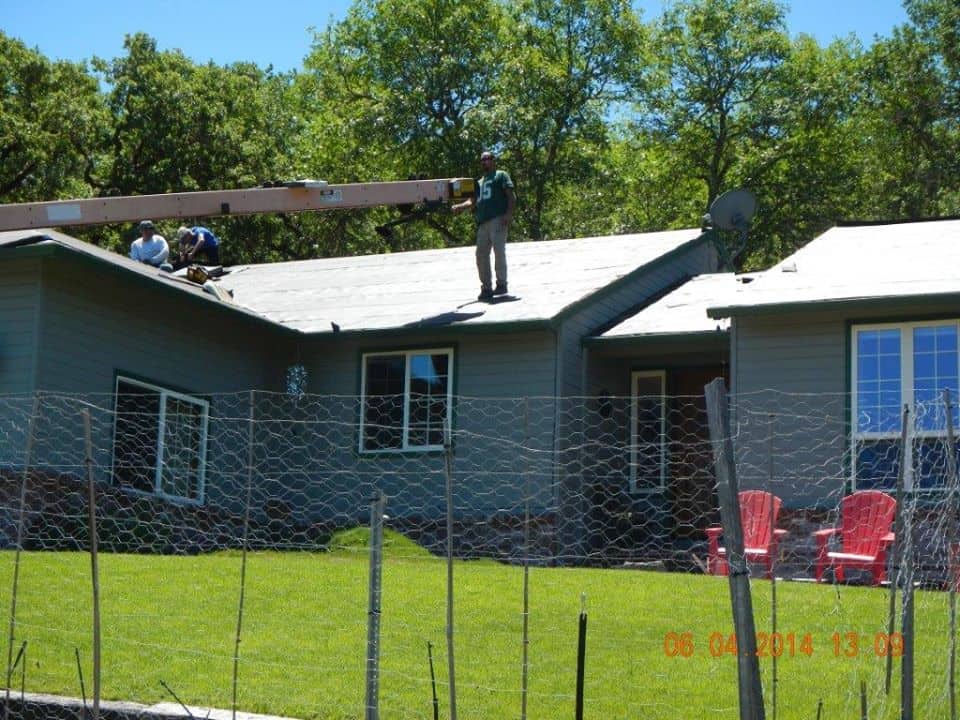 An old photo of a single story home we re-roofed.